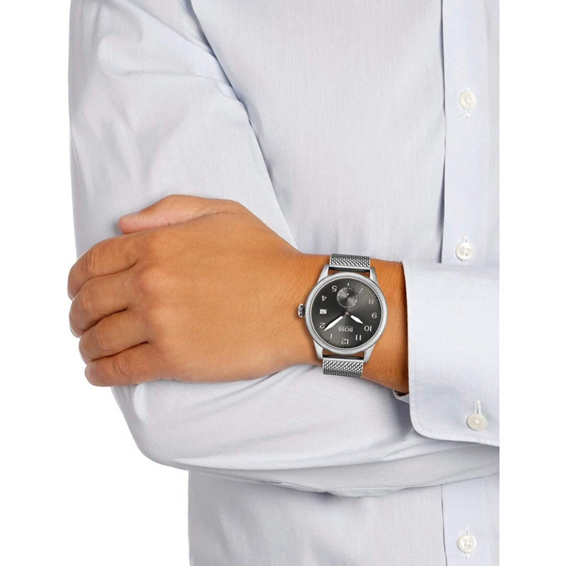 Hugo Boss men's watch worn on wrist with grey dial and mesh strap
