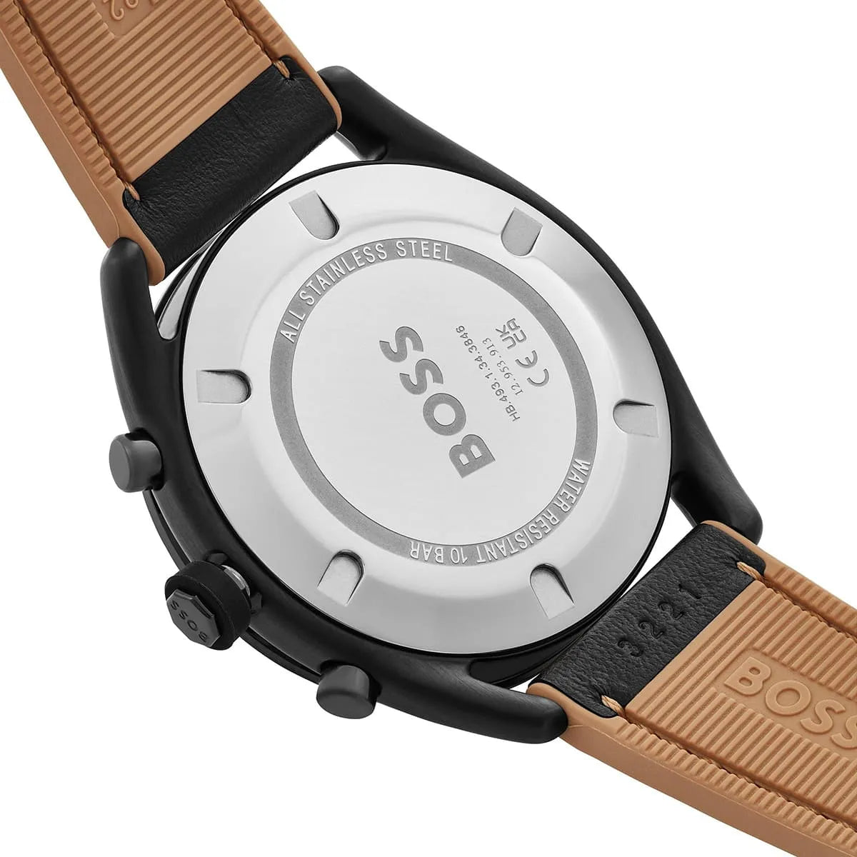 Hugo BOSS Center Court watch caseback showing stainless steel case and tan rubber strap attachment
