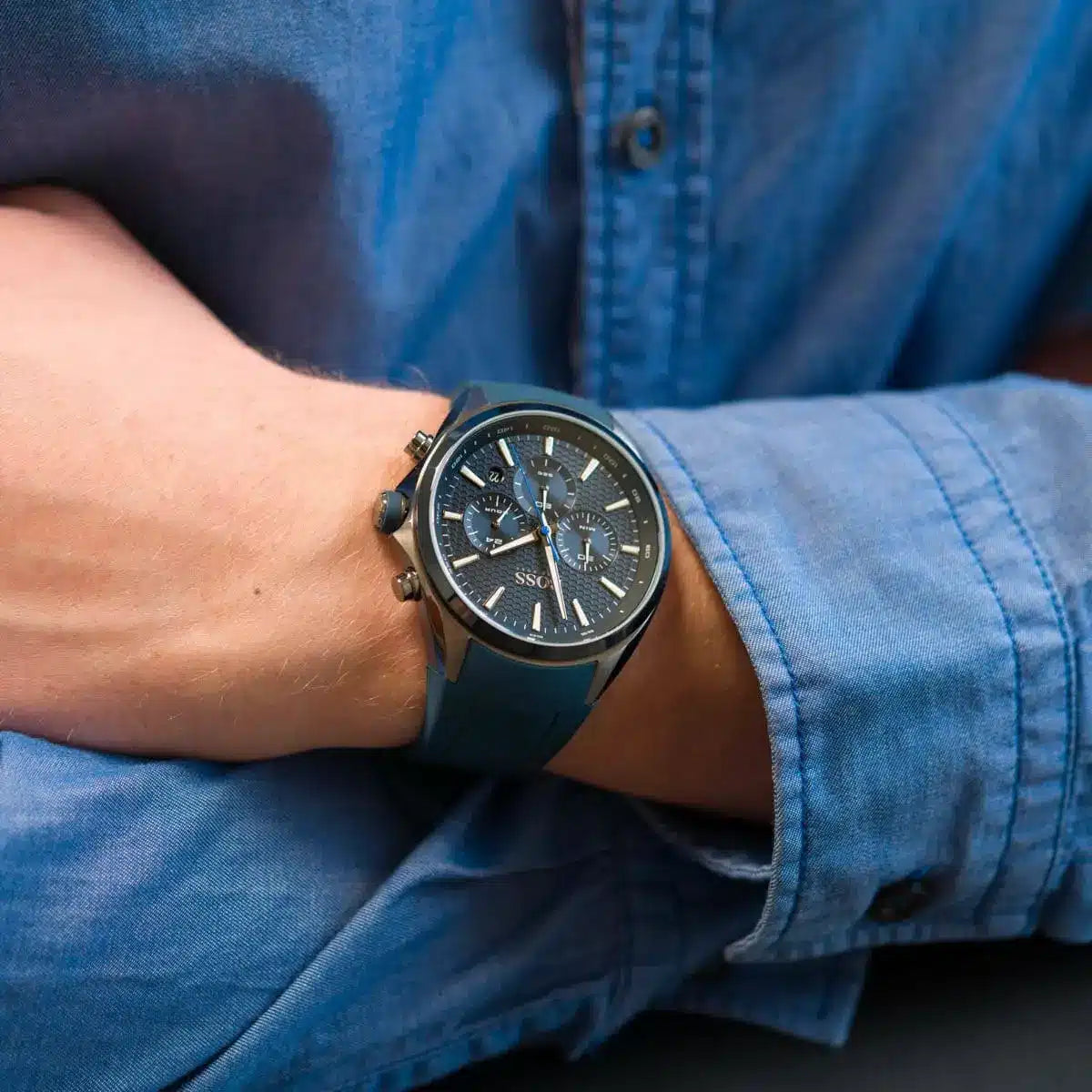Hugo Boss Distinct watch caseback on wrist showing stainless steel back and silicone strap