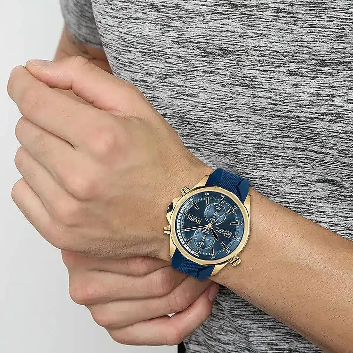 Hugo Boss Globetrotter men's watch on wrist showing blue dial and chronograph function