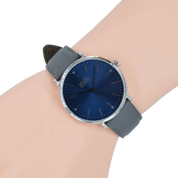 Hugo Boss Horizon watch on wrist displaying blue dial with index markers and gray strap