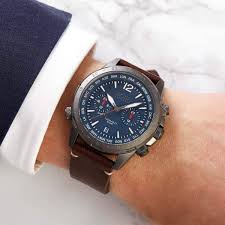 Hugo Boss Nomad chronograph watch on-wrist photo showing blue dial and brown leather strap