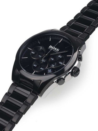 Hugo Boss Onyx chronograph watch worn on wrist showing black dial and metal bracelet