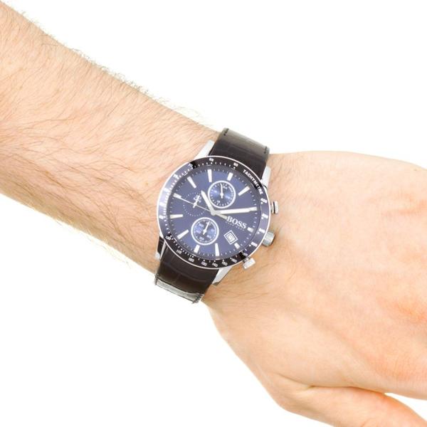 Hugo Boss Rafale chronograph watch worn on wrist showing blue dial and black leather strap