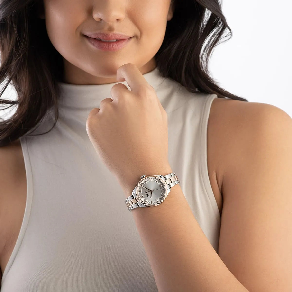 Hugo Boss Sage ladies watch worn on wrist showing silver dial and two-tone rose gold bracelet