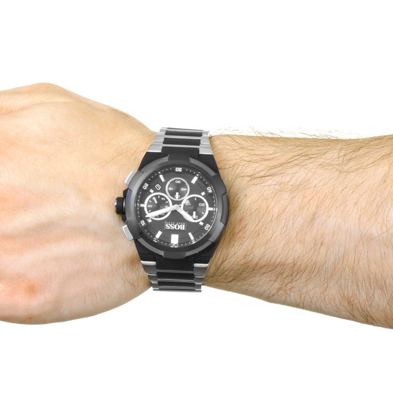 Hugo Boss Supernova chronograph on wrist showing black dial and steel strap