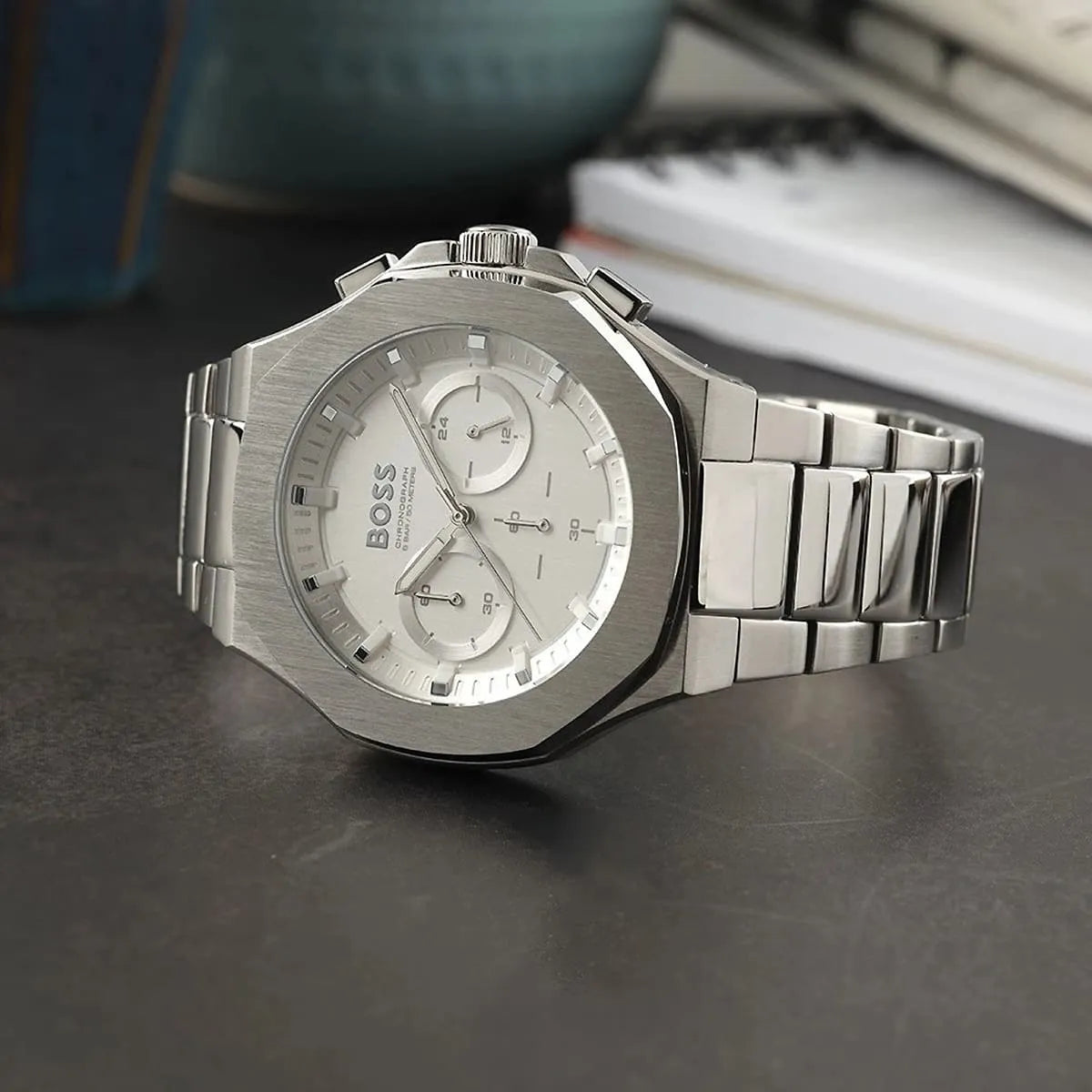 Hugo Boss Taper chronograph on wrist showing white dial and silver case