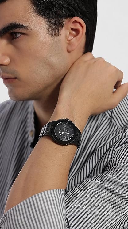 Hugo Boss Taper chronograph watch displayed on man's wrist, side profile view
