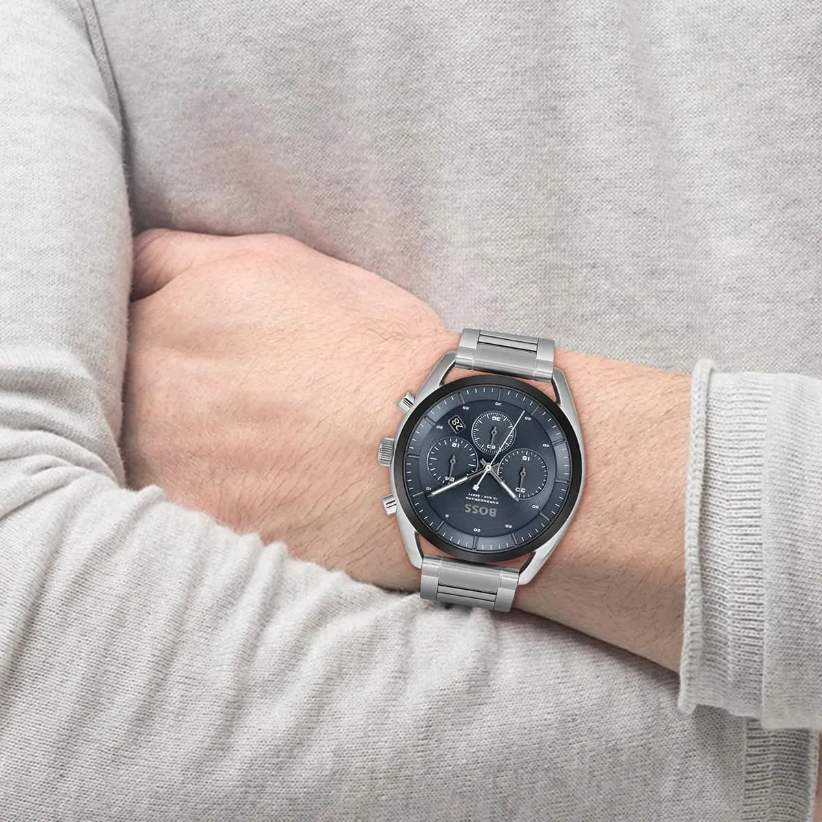 Hugo Boss Top Chronograph worn on wrist, showing blue dial and stainless steel bracelet