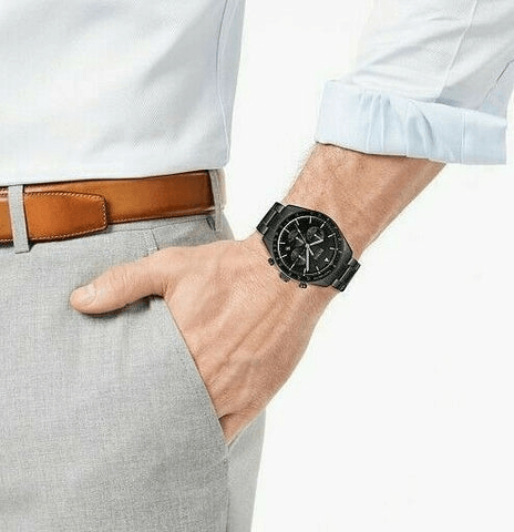 Hugo Boss Trophy chronograph watch worn on wrist with white shirt and tan belt