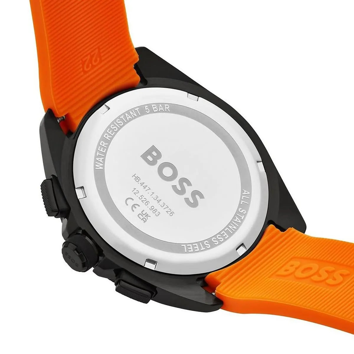 Close-up of Hugo Boss Volane watch face showing black dial with three chronograph subdials and orange accents