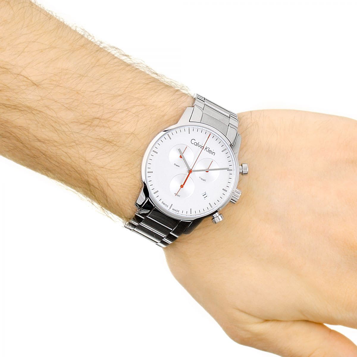 Calvin Klein Gent City watch on wrist displaying chronograph dial and silver stainless steel band