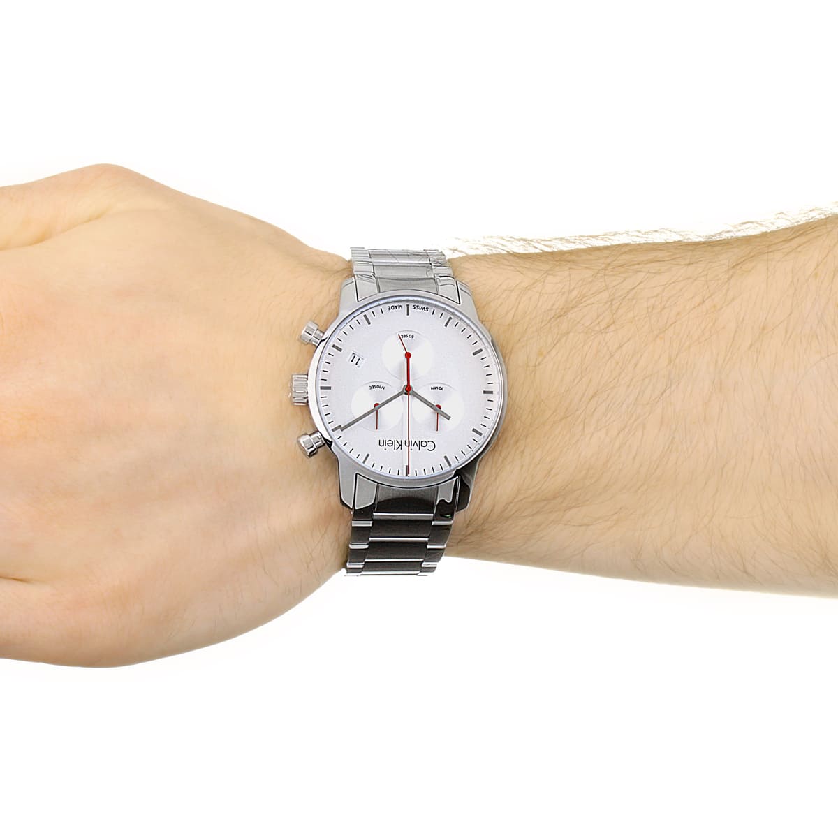 Calvin Klein Gent City chronograph watch worn on wrist showing white dial and metal bracelet