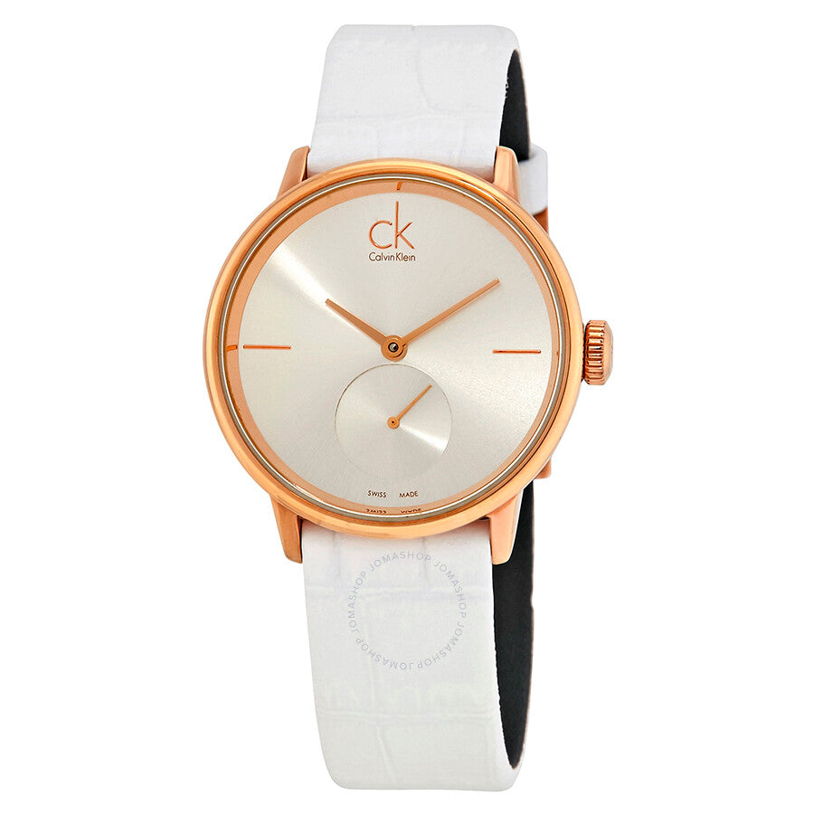 Calvin Klein Accent women's watch worn on wrist with white leather strap