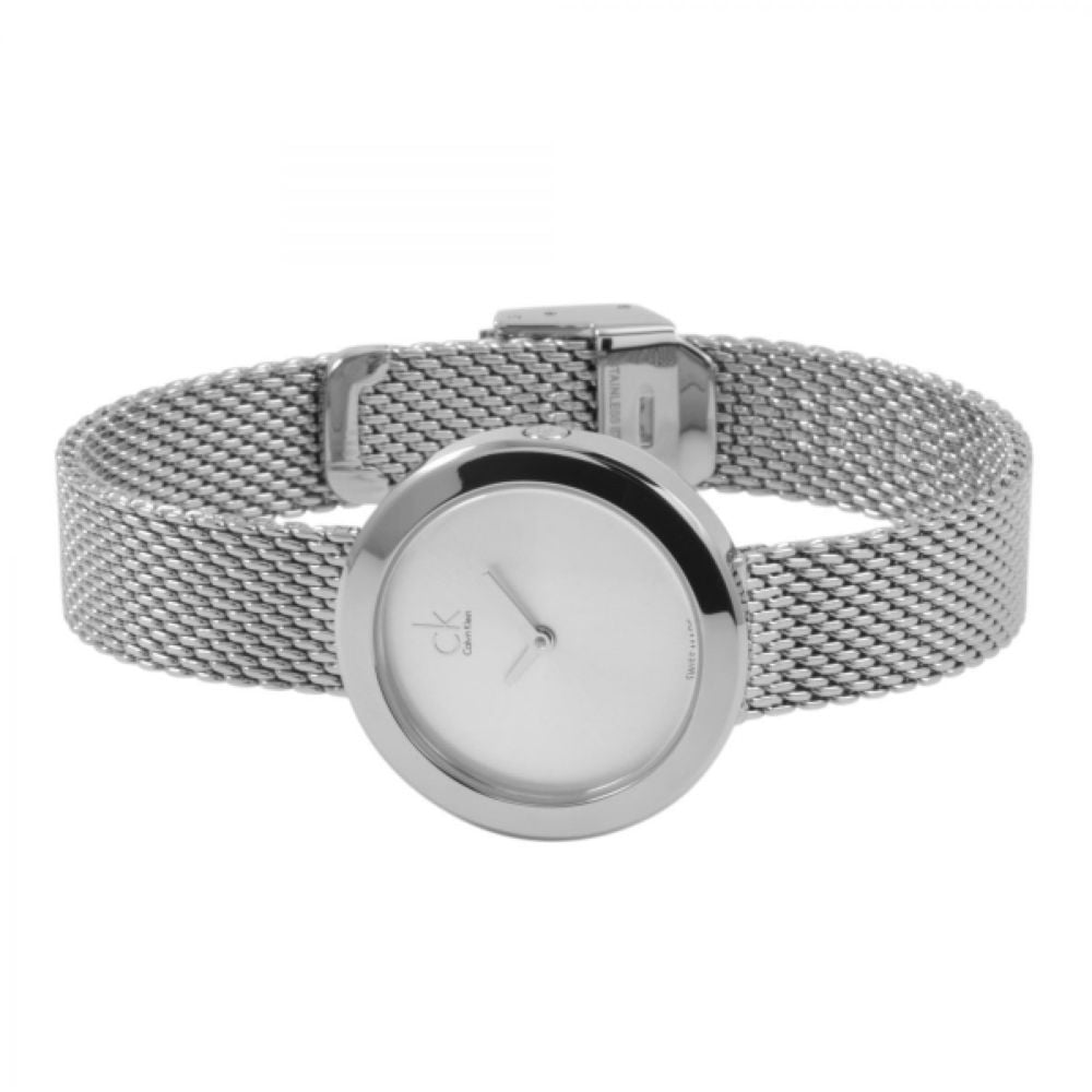 Overhead view of Calvin Klein K3N23126 watch on wrist with mesh bracelet and white dial