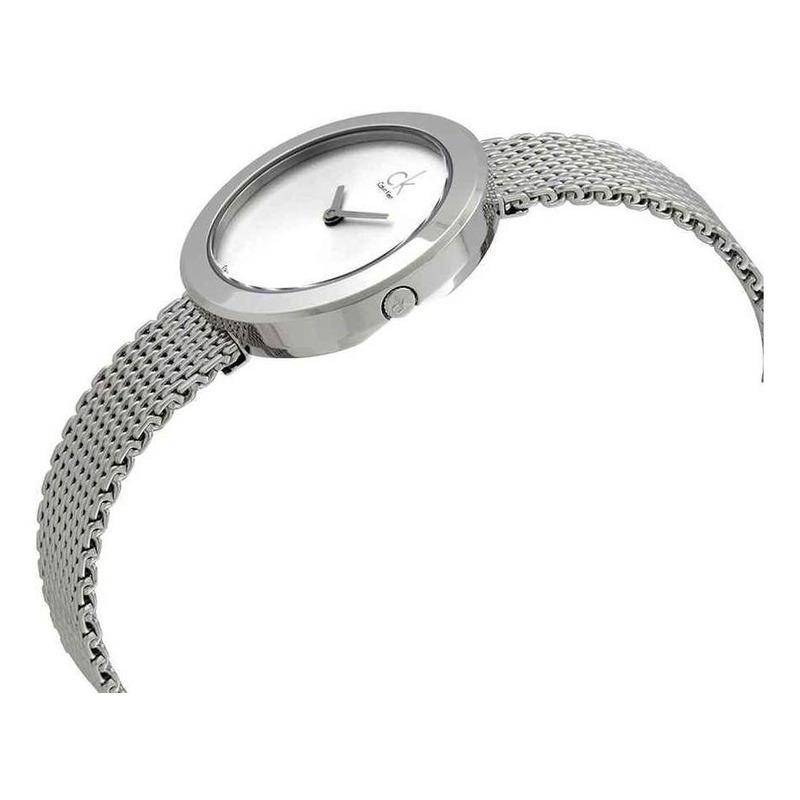 Calvin Klein Firm ladies watch worn on wrist showing slim silver case and mesh band