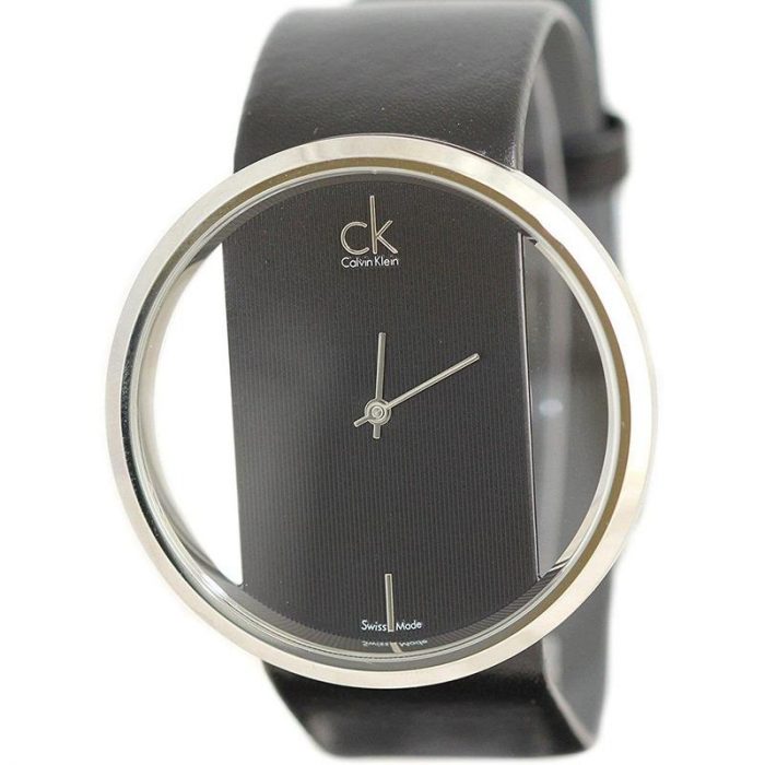 Calvin Klein Glam women's watch angled view with metallic round case and black strap