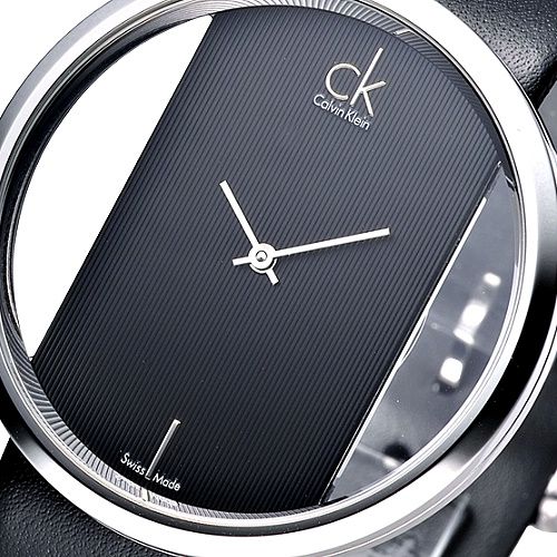 Close-up detail of Calvin Klein Glam transparent dial with minimalist hour markers