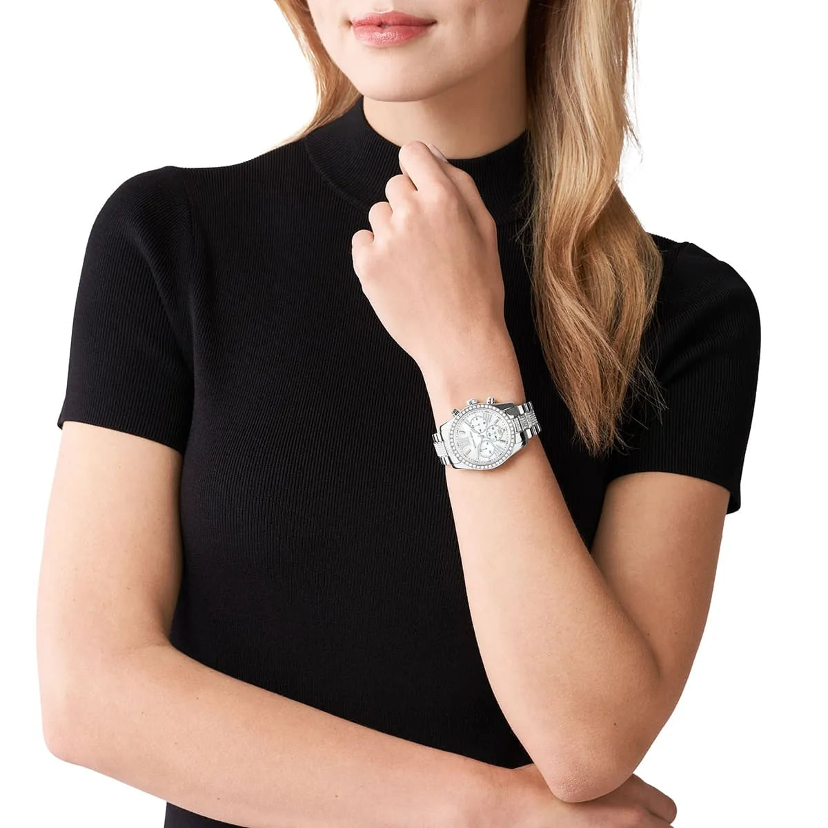 Woman wearing silver-tone Lexington chronograph watch with crystal-pavé bezel