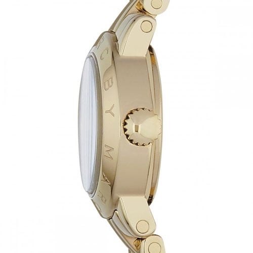 Side view of Amy watch showing gold case profile and crown detail