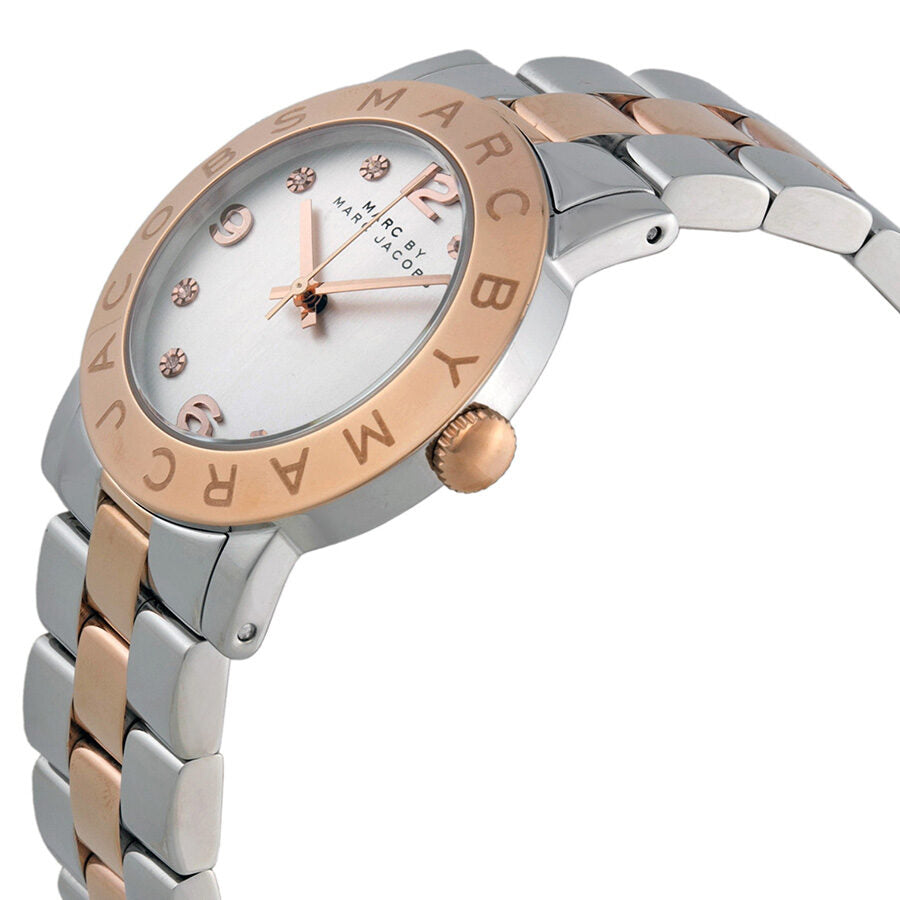 Side angle view of Blade watch showing rose gold bezel and two-tone bracelet detail