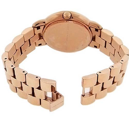 Angled view of Marc By Marc Jacobs Marci MBM3099 rose gold watch and bracelet