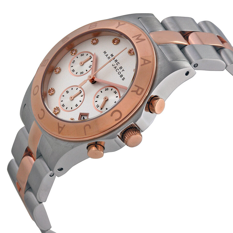 Side angle view of MBM3178 chronograph with visible case, bezel, pushers, and two-tone bracelet