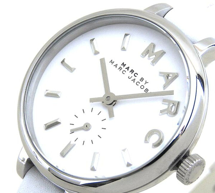 Close-up detail of Sally watch white dial with index markers and subdial