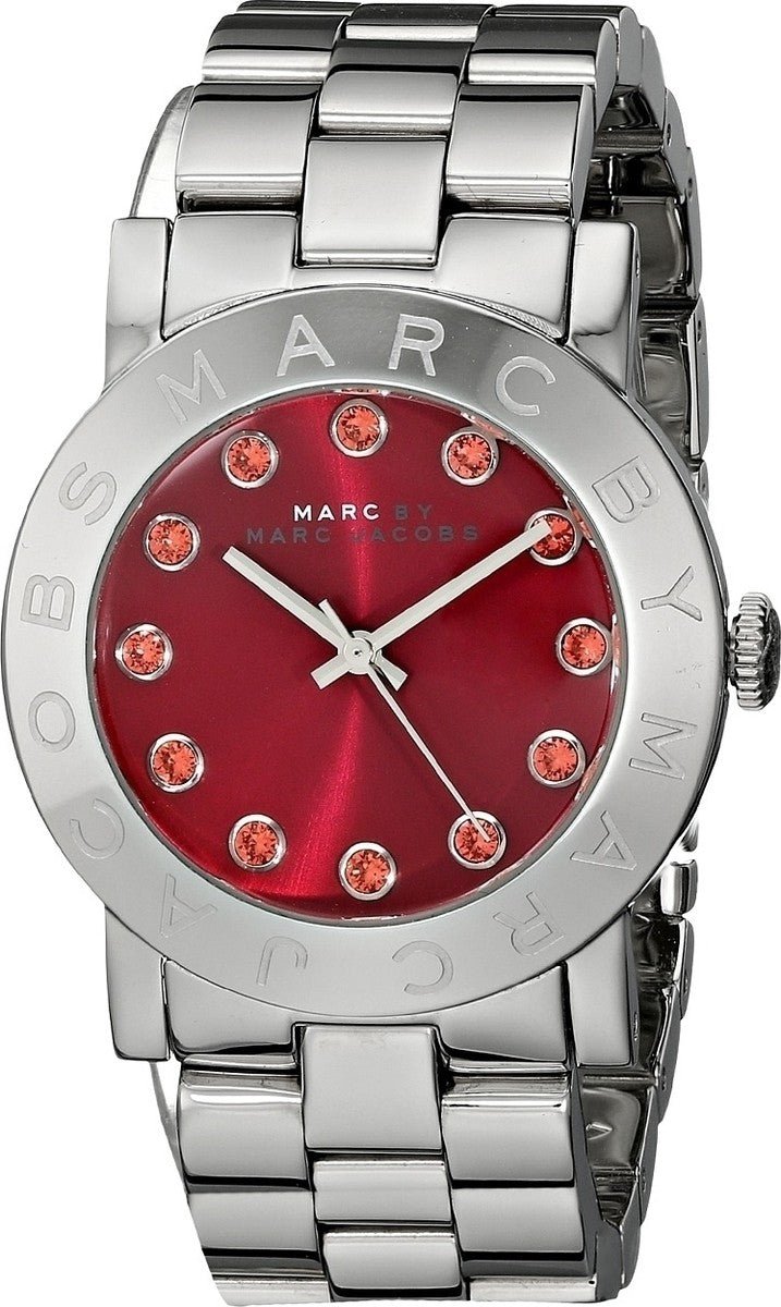 Marc Jacobs Amy watch angled view showing red dial and steel bracelet band