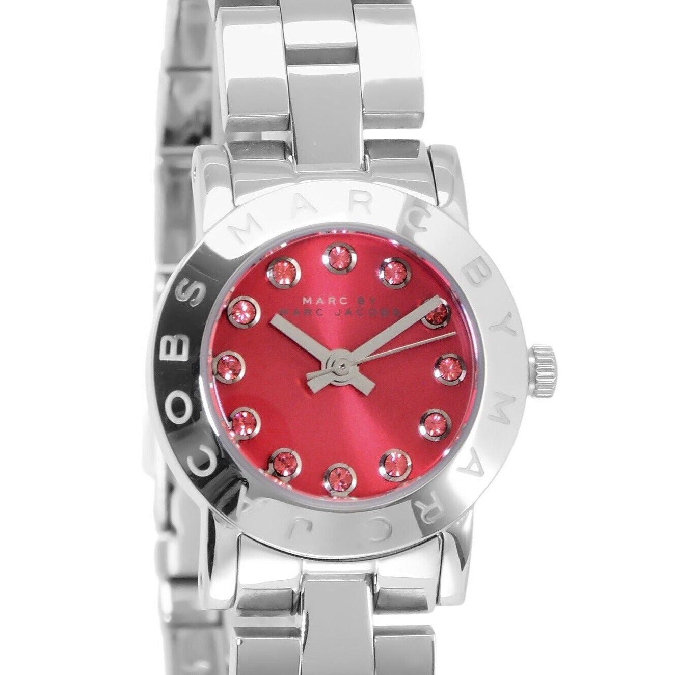 Marc Jacobs Amy dial close-up showing red face with crystal indices and steel bezel