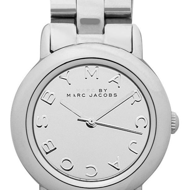 Close-up of silver dial with embossed hour markers and Marc by Marc Jacobs text
