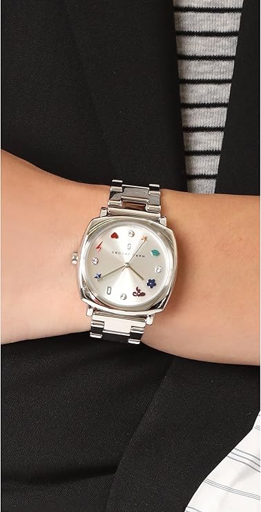 Marc Jacobs MJ3548 womens watch worn on wrist with silver dial and icon markers