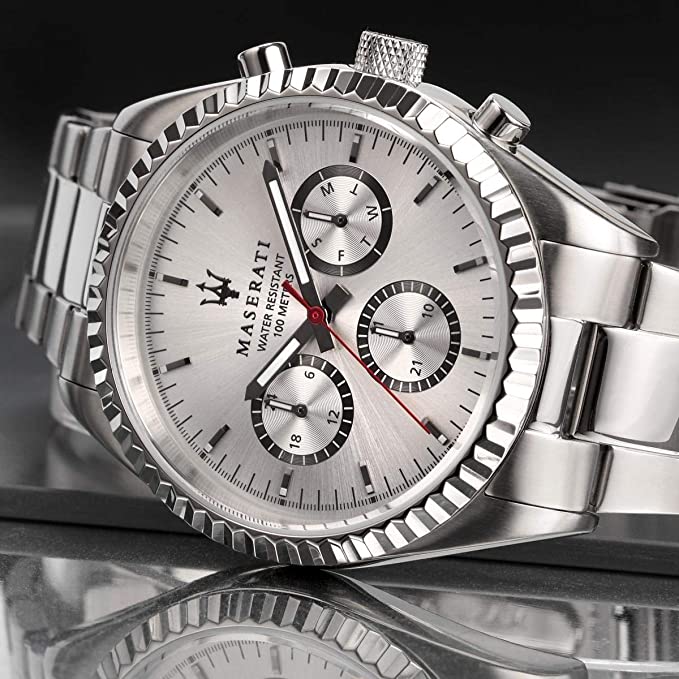 Close-up of Maserati watch dial showing chronograph subdials and red seconds hand