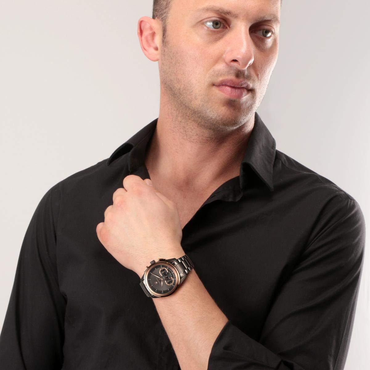 Maserati black dial watch worn on wrist with rose gold bezel and black steel band