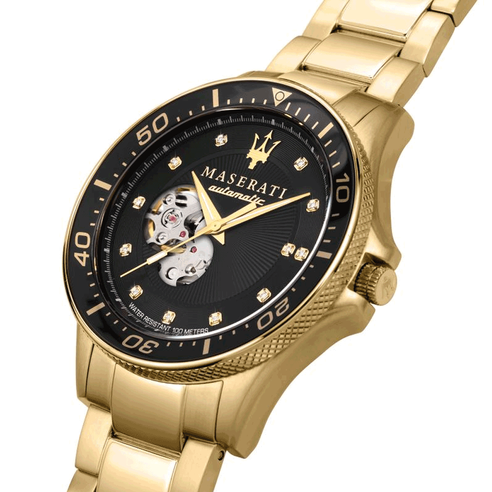 Maserati Sfida watch angled view showing black dial, yellow gold case, and visible movement