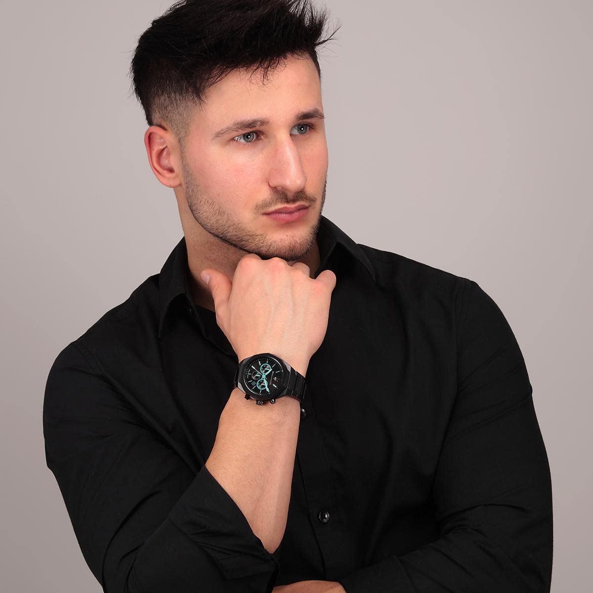 Man wearing Maserati Stile black chronograph watch on wrist