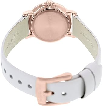 Side view of Baker watch displaying rose gold case, white leather band, and buckle closure