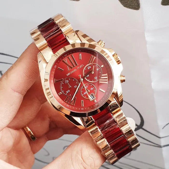 Michael Kors Bradshaw burgundy chronograph watch worn on wrist showing dial detail