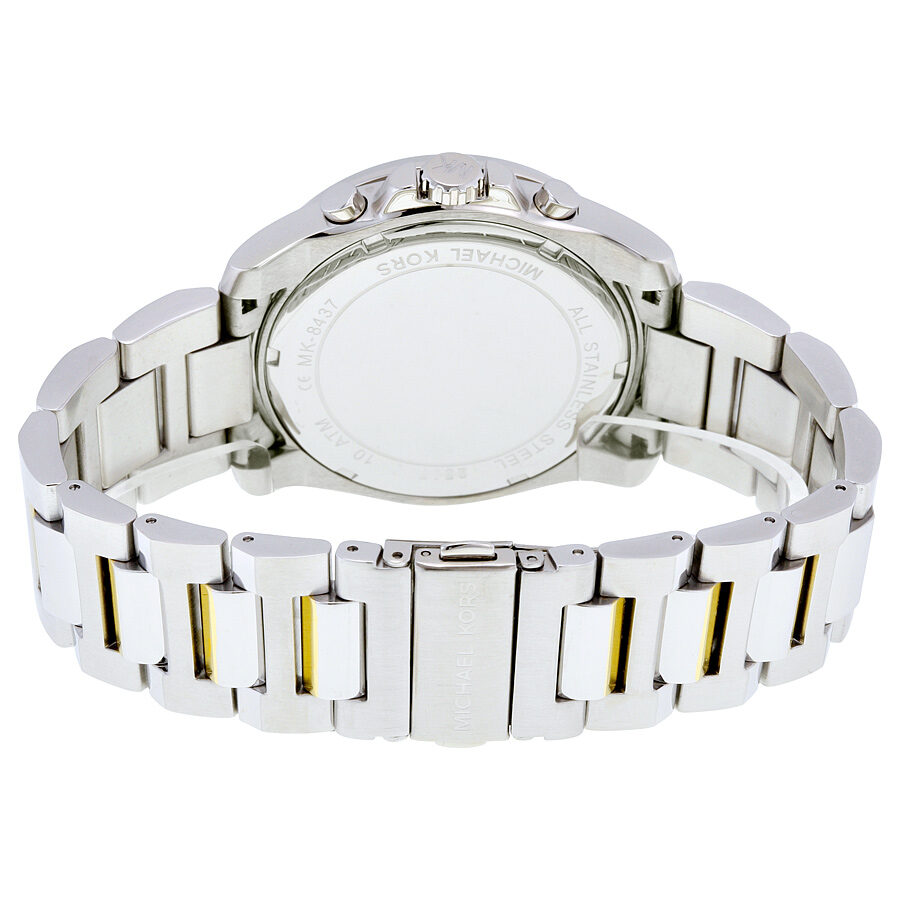 Michael Kors Brecken watch case back showing silver and gold two-tone bracelet and clasp