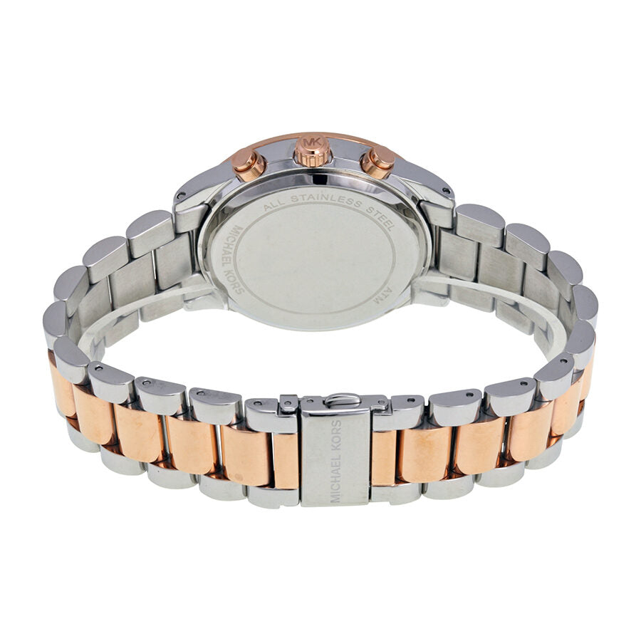 Michael Kors Brinkley watch caseback showing stainless steel and rose gold bracelet
