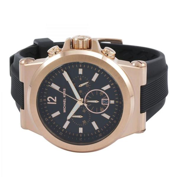 Michael Kors Dylan chronograph showing rose gold case with black rubber strap