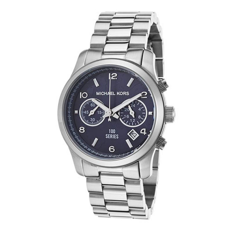 Michael Kors Hunger Stop Chronograph three-quarter view showing blue dial and silver bracelet