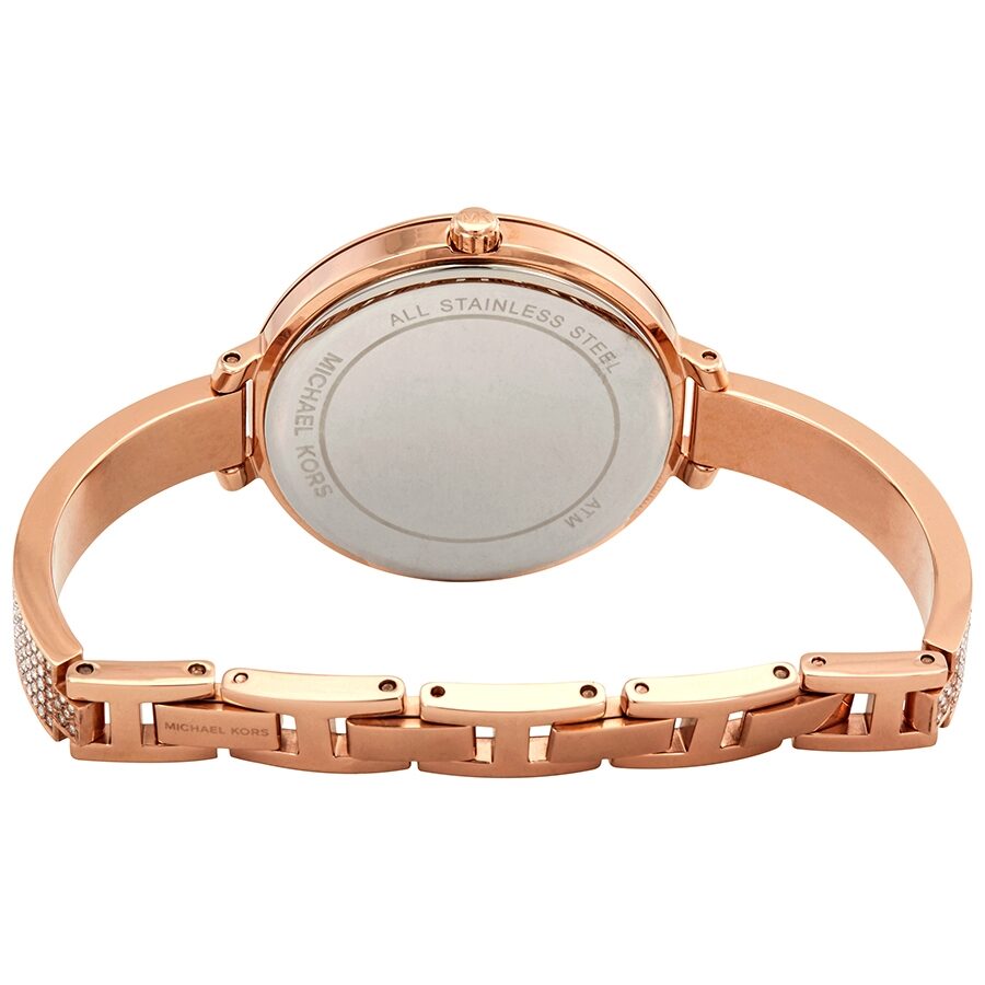 Michael Kors Jaryn Crystal watch caseback showing stainless steel with rose gold bracelet