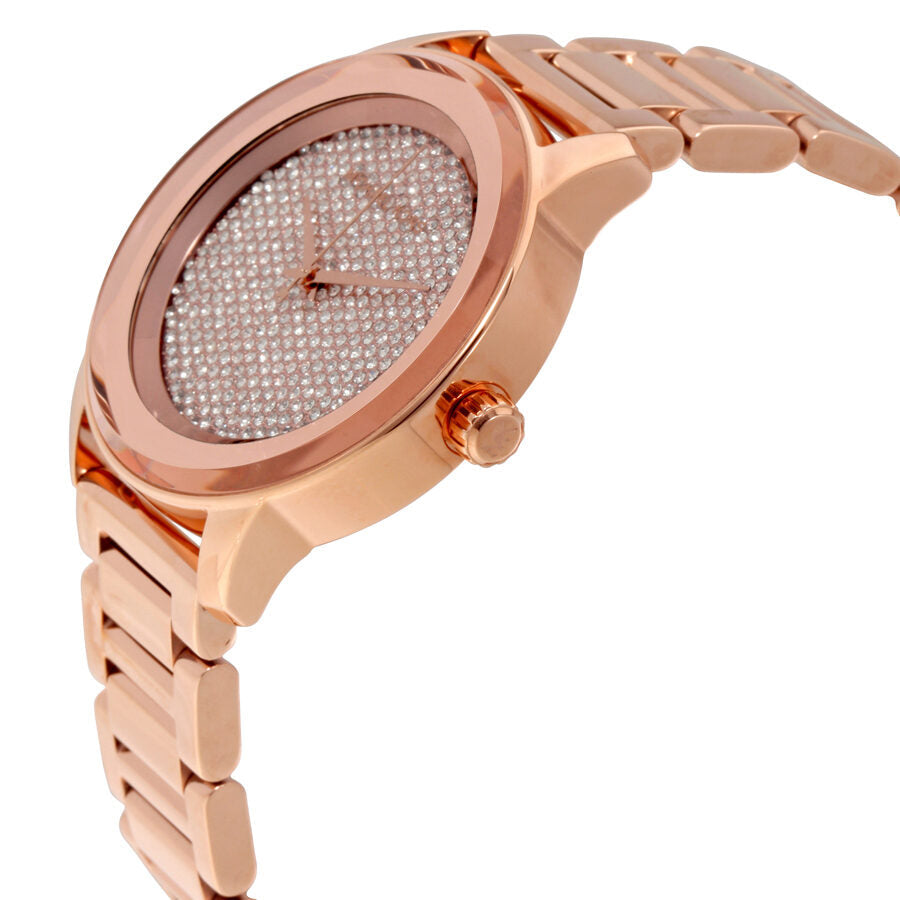 Side angle view of Michael Kors Kinley rose gold watch showing pave dial and rose gold bracelet