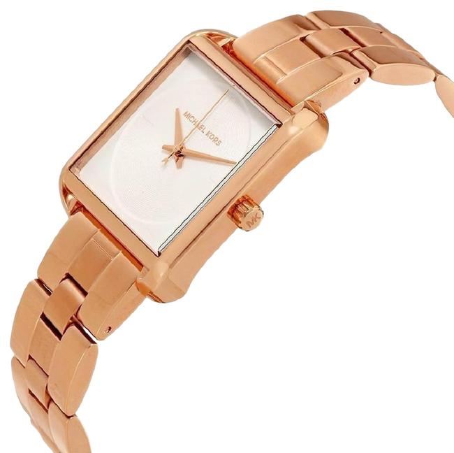 Michael Kors Lake MK3645 angled view showing white dial and rose gold-tone metal bracelet