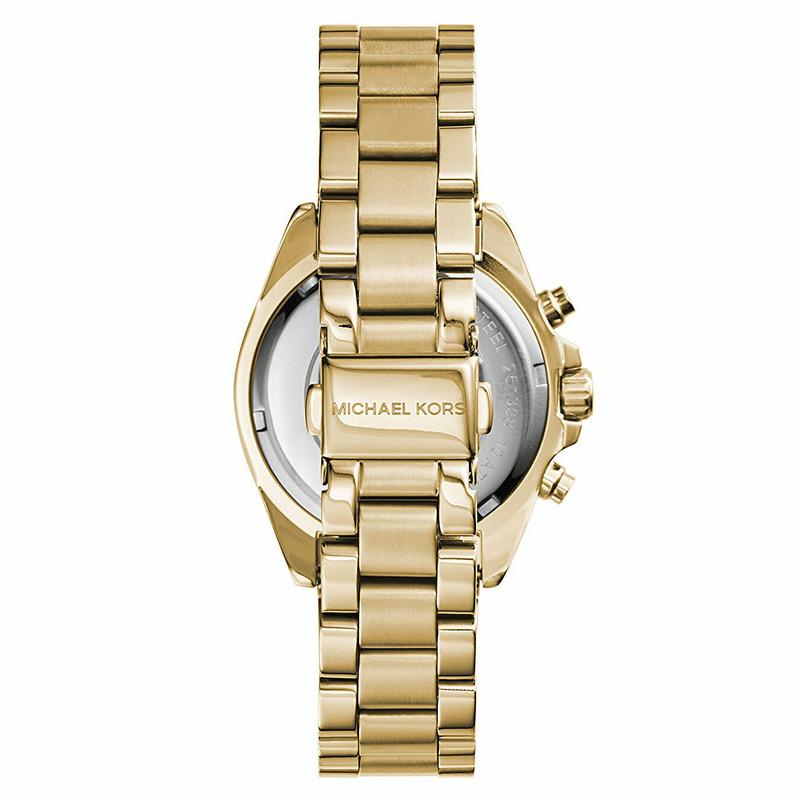 Michael Kors Mini Bradshaw watch caseback showing gold-tone link bracelet and brand engrave