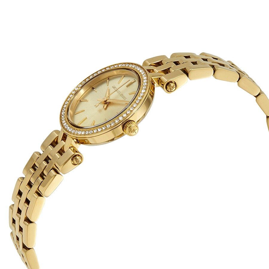 Michael Kors Mini Darci watch side angle showing champagne dial and gold-tone link bracelet