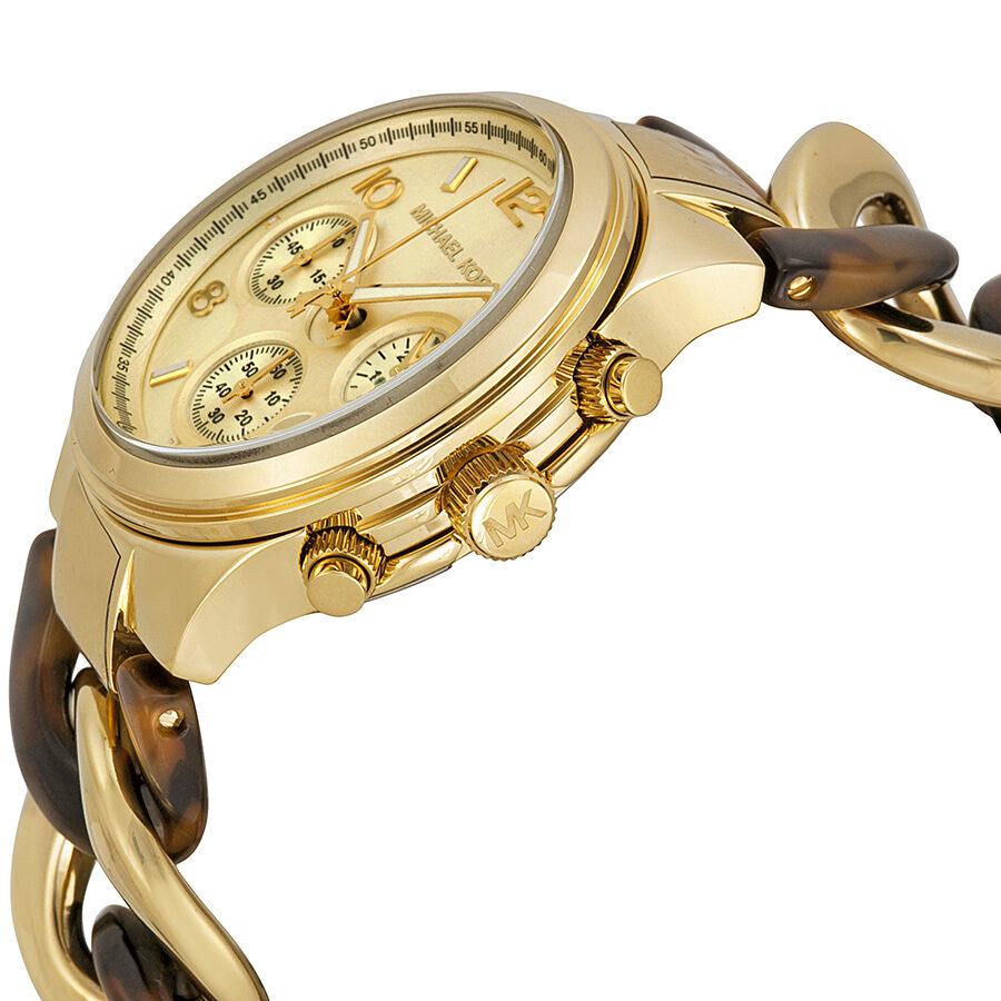 Side angle of MK4222 showing gold case, cream chronograph dial with subdials, and acrylic link strap