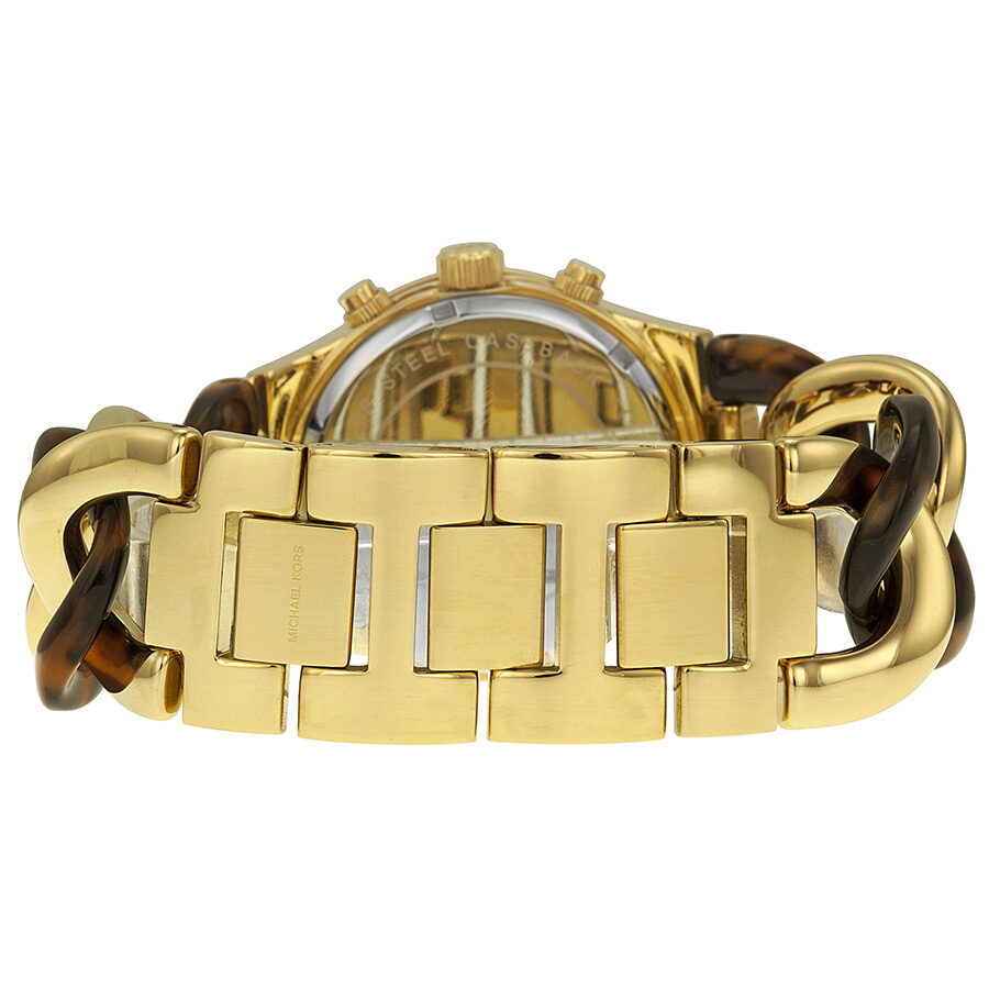 MK4222 strap detail showing gold-tone rectangular links alternating with tortoise-print acrylic segments