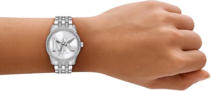 Michael Kors MK7542 chronograph watch on wrist with stainless steel bracelet